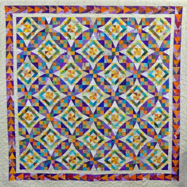 Multicoloured patchwork quilt